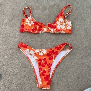 Orange Bikini with flowers. Old but fairly good condition.